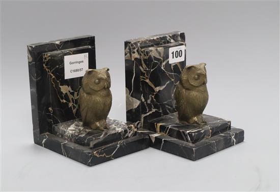 A pair of bronze and marble owl bookends height 14cm